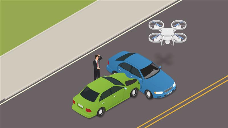 IoT sensors detect car crash on public road. Before ambulance and firefighters arrive, drone is sent to inspect area